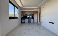 Новая квартира 70 м² в резиденции отельного типа в Махмутларе-id-9300-фото-2