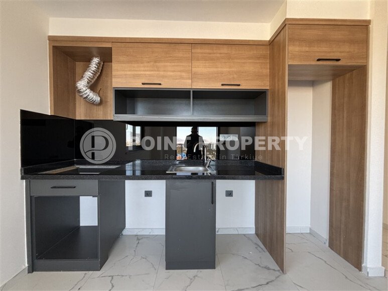 Новая квартира 70 м² в резиденции отельного типа в Махмутларе-id-9300-фото-3