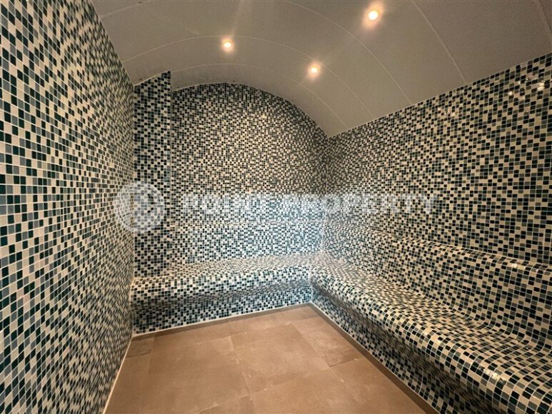 Новая квартира 70 м² в резиденции отельного типа в Махмутларе-id-9300-фото-19