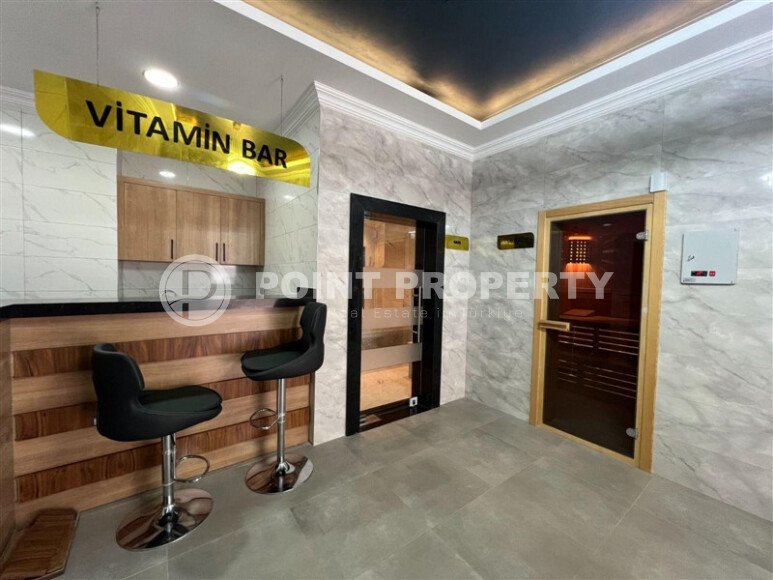 Новая квартира 70 м² в резиденции отельного типа в Махмутларе-id-9300-фото-21