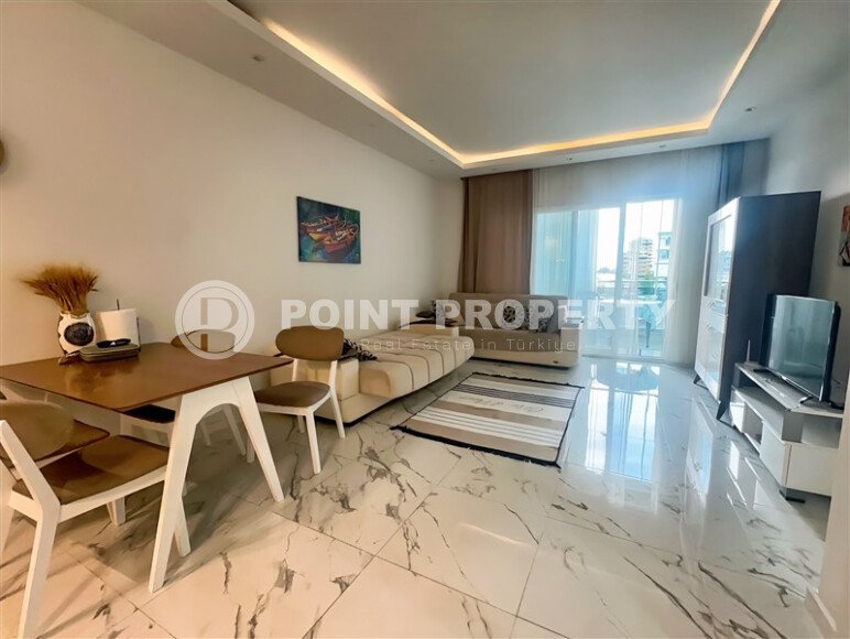 Просторная квартира 1+1 с видом на море в Махмутларе-id-9311-фото-2