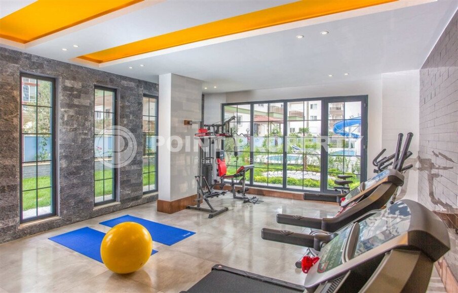 Просторная квартира 1+1 с видом на море в Махмутларе-id-9311-фото-16