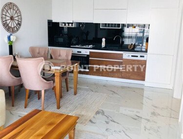 Просторная квартира 1+1 70 м2 с мебелью и видом на море в Махмутларе-id-9312-фото-2