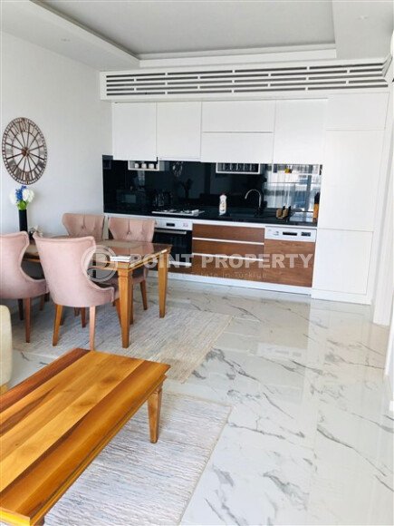 Просторная квартира 1+1 70 м2 с мебелью и видом на море в Махмутларе-id-9312-фото-2