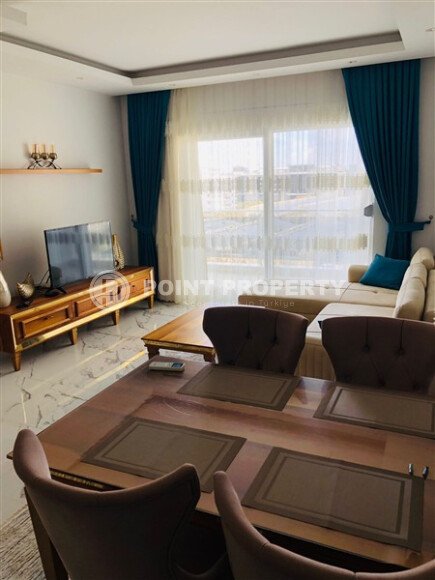 Просторная квартира 1+1 70 м2 с мебелью и видом на море в Махмутларе-id-9312-фото-4