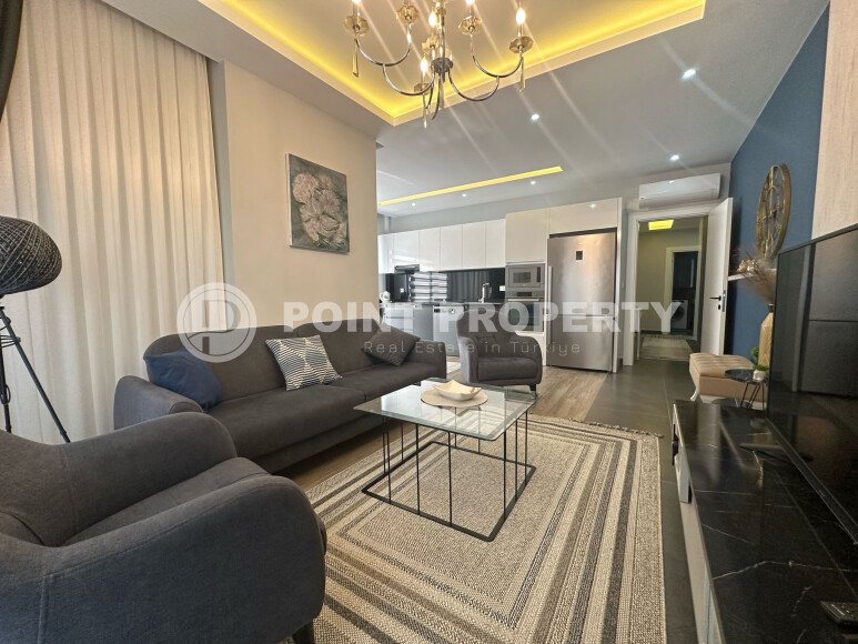 Spacious apartment 2+1 100 m2 with furniture in a new building in Mahmutlar district-id-9313-photo-1