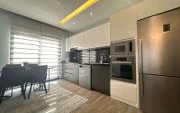 Spacious apartment 2+1 100 m2 with furniture in a new building in Mahmutlar district-id-9313-photo-2