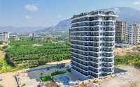 Светлая квартира 1+1 54 м² в Махмутларе-id-9322-фото-1