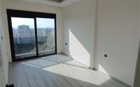 Светлая квартира 1+1 54 м² в Махмутларе-id-9322-фото-4
