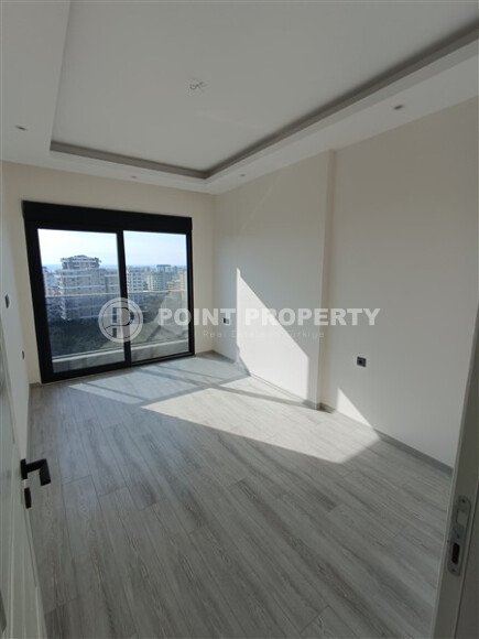 Светлая квартира 1+1 54 м² в Махмутларе-id-9322-фото-4