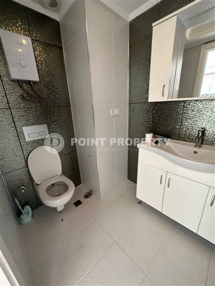 Квартира 1+1, общей площадью 70 м2, в центре живописного района Аланьи - Тосмур и в километре от моря-id-7672-фото-5