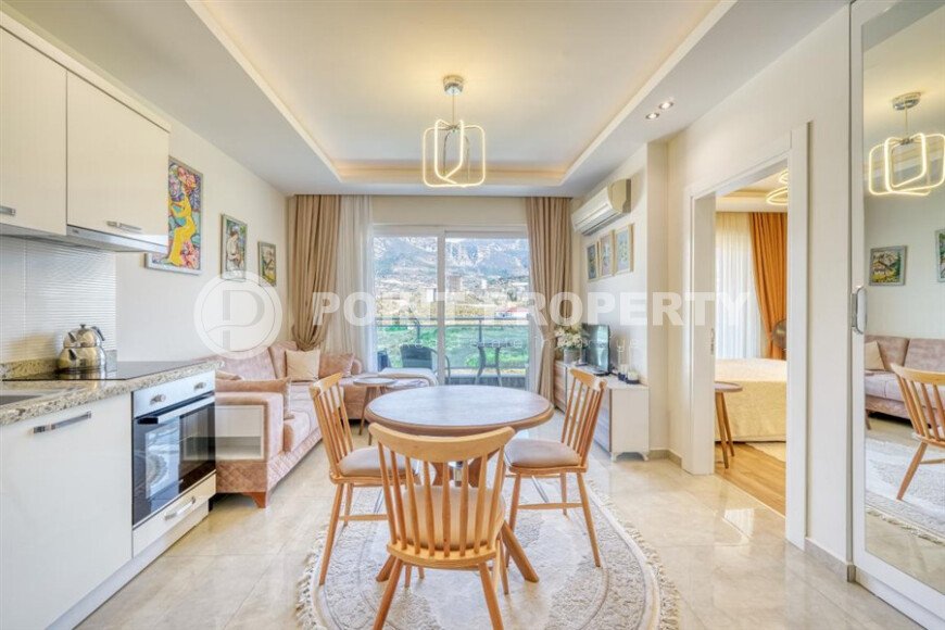 Стильная квартира с красивым видом на горы в районе Махмутлар-id-9337-фото-4