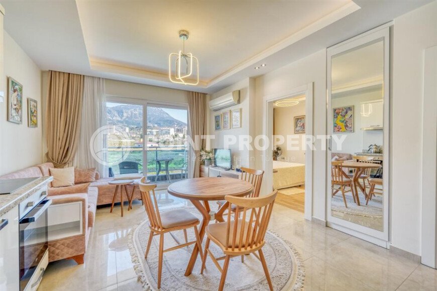 Стильная квартира с красивым видом на горы в районе Махмутлар-id-9337-фото-7