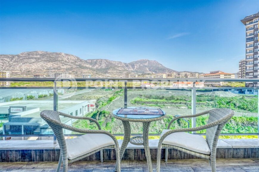 Стильная квартира с красивым видом на горы в районе Махмутлар-id-9337-фото-11