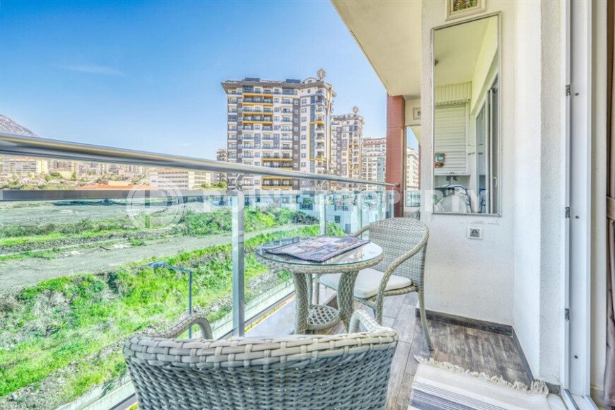 Стильная квартира с красивым видом на горы в районе Махмутлар-id-9337-фото-12