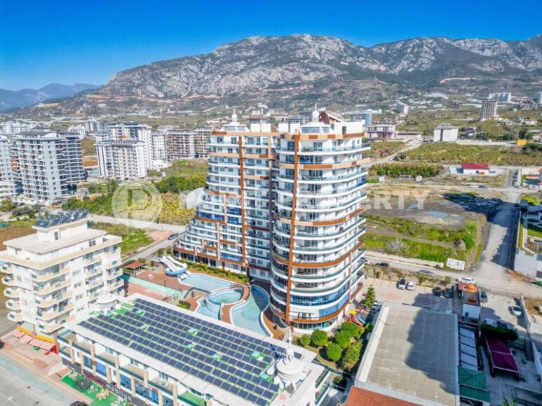 Стильная квартира с красивым видом на горы в районе Махмутлар-id-9337-фото-15