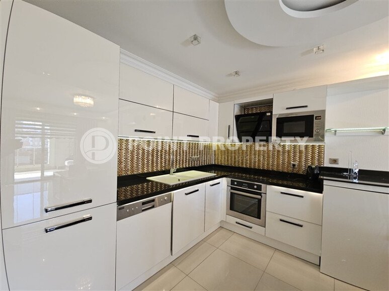 Spacious 74 m² apartment with sea view in Mahmutlar, close to the beach-id-9351-photo-2