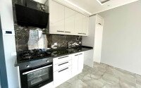 Новая квартира 1+1 в самом центре Махмутлара-id-9353-фото-1