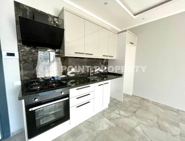 New 1+1 apartment in the very center of Mahmutlar-id-9353-photo-18