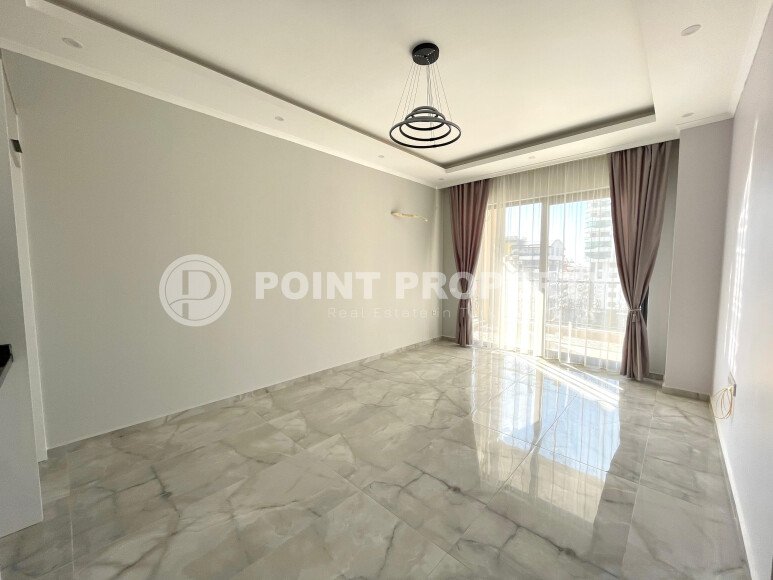 Новая квартира 1+1 в самом центре Махмутлара-id-9353-фото-2