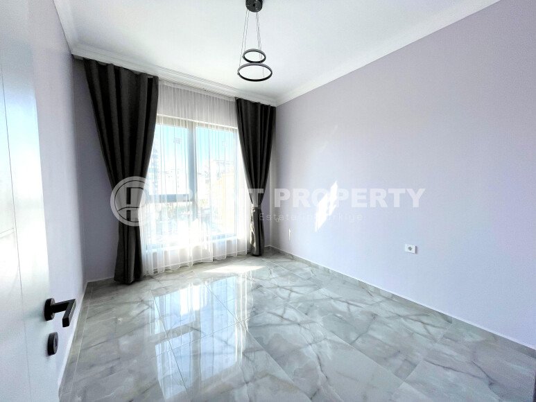 Новая квартира 1+1 в самом центре Махмутлара-id-9353-фото-3