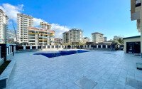 Новая квартира 1+1 в самом центре Махмутлара-id-9353-фото-14