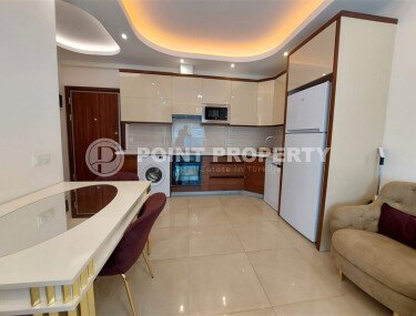 Комфортная квартира 56 м² в престижном комплексе в Махмутларе-id-9357-фото-2