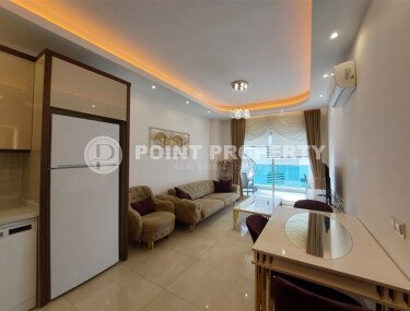 Комфортная квартира 56 м² в престижном комплексе в Махмутларе-id-9357-фото-3