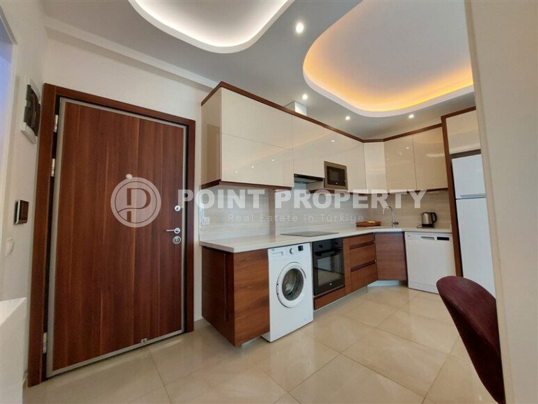 Комфортная квартира 56 м² в престижном комплексе в Махмутларе-id-9357-фото-5