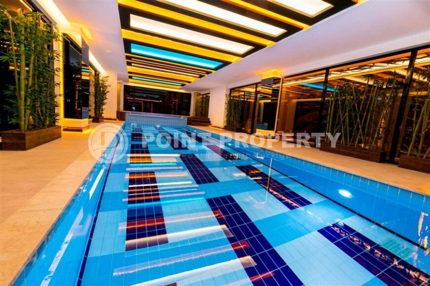 Комфортная квартира 56 м² в престижном комплексе в Махмутларе-id-9357-фото-24