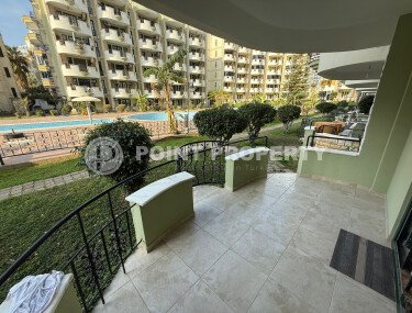 Апартаменты 50 м² с садом на первой береговой линии в Махмутларе-id-9365-фото-2