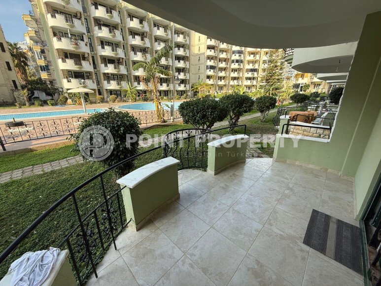 Апартаменты 50 м² с садом на первой береговой линии в Махмутларе-id-9365-фото-2