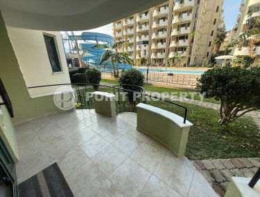 Апартаменты 50 м² с садом на первой береговой линии в Махмутларе-id-9365-фото-3