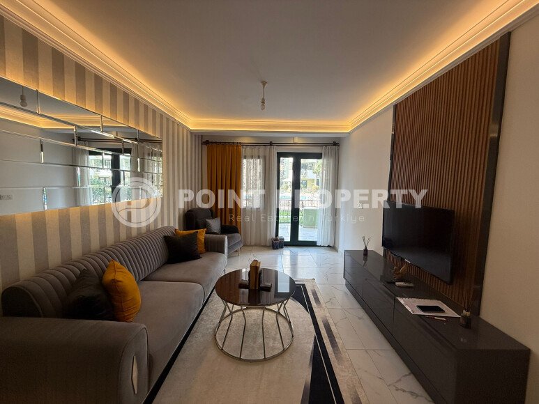 Апартаменты 50 м² с садом на первой береговой линии в Махмутларе-id-9365-фото-7