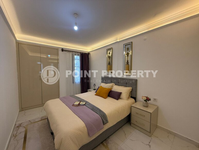 Апартаменты 50 м² с садом на первой береговой линии в Махмутларе-id-9365-фото-8