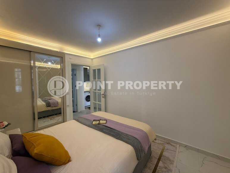 Апартаменты 50 м² с садом на первой береговой линии в Махмутларе-id-9365-фото-9