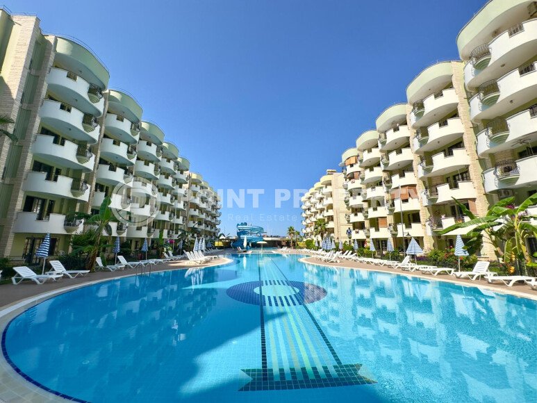 Апартаменты 50 м² с садом на первой береговой линии в Махмутларе-id-9365-фото-11