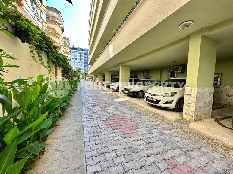 Апартаменты 50 м² с садом на первой береговой линии в Махмутларе-id-9365-фото-12