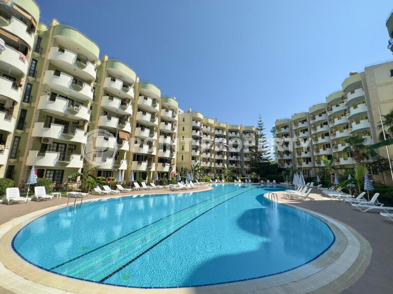 Апартаменты 50 м² с садом на первой береговой линии в Махмутларе-id-9365-фото-13