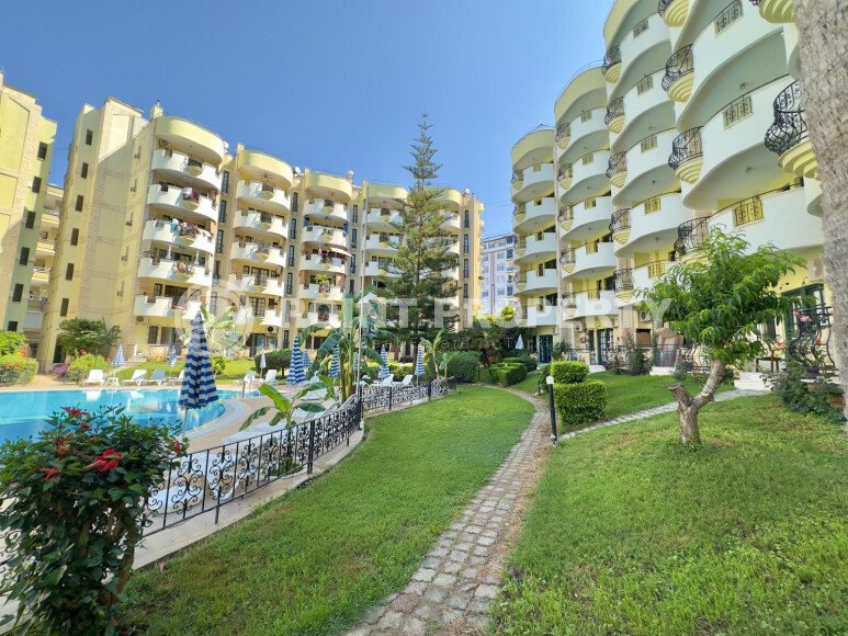 Апартаменты 50 м² с садом на первой береговой линии в Махмутларе-id-9365-фото-14