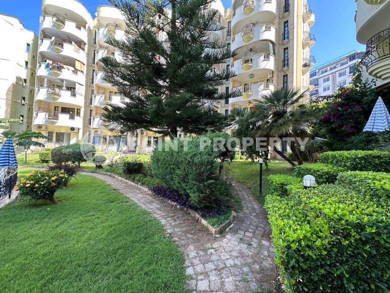 Апартаменты 50 м² с садом на первой береговой линии в Махмутларе-id-9365-фото-15