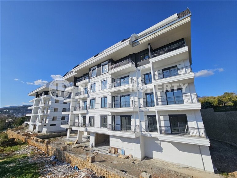 Квартира с двумя спальнями и отдельной кухней в районе Оба-id-9379-фото-17