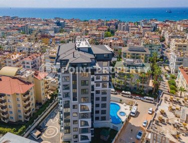 Bright apartment 56 m² in the center of Alanya with sea view-id-9387-photo-1
