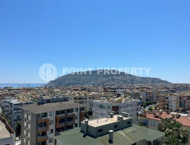 Bright apartment 56 m² in the center of Alanya with sea view-id-9387-photo-3