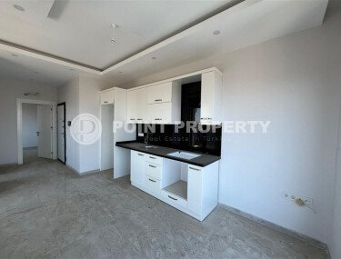 Bright apartment 56 m² in the center of Alanya with sea view-id-9387-photo-4