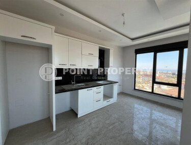 Bright apartment 56 m² in the center of Alanya with sea view-id-9387-photo-5