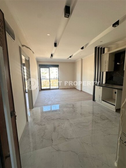 Квартира 55 м² в районе Оба в современном комплексе-id-9391-фото-3