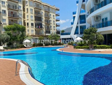 Квартира 1+1, 105 м² на первой линии в районе Махмутлар-id-9393-фото-2