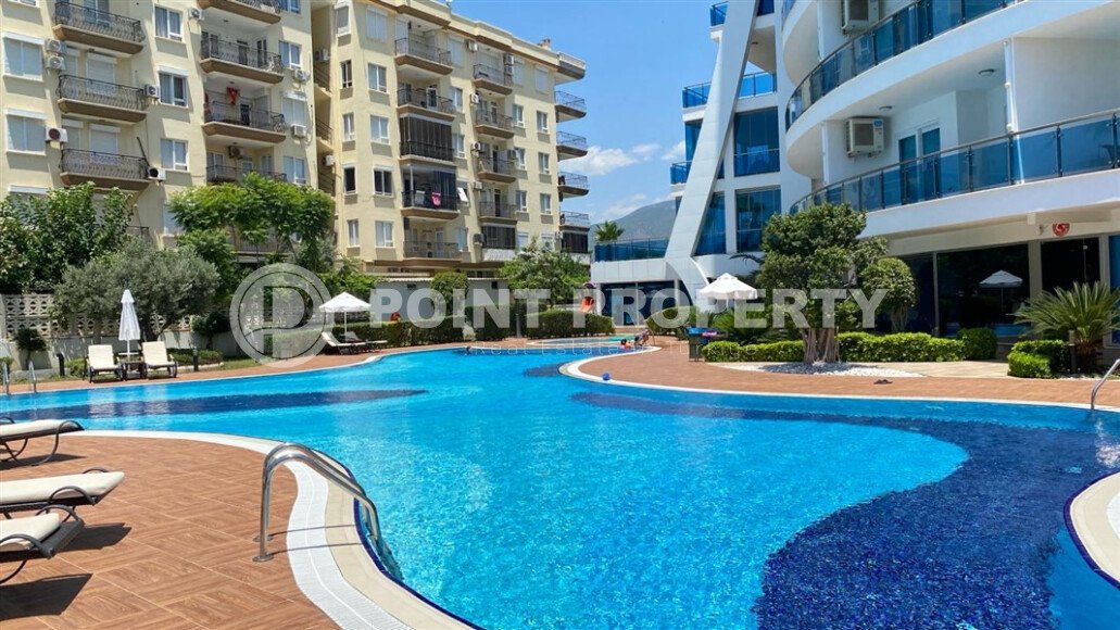 Квартира 1+1, 105 м² на первой линии в районе Махмутлар-id-9393-фото-2