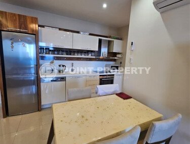 Квартира 1+1, 105 м² на первой линии в районе Махмутлар-id-9393-фото-4